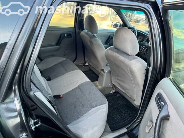 Nissan Primera II (P11) Рестайлинг 1.8 MT