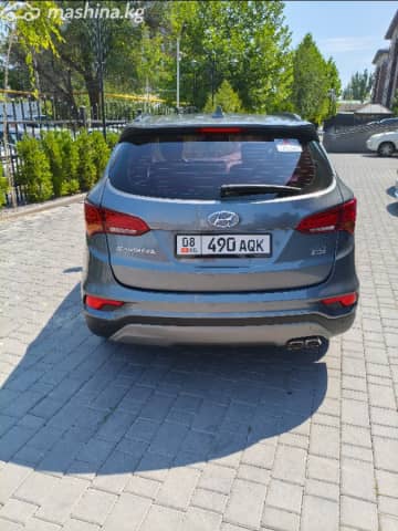 Hyundai Santa Fe III Рестайлинг 2.0d AT 4WD