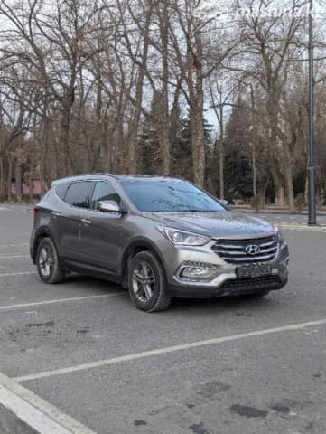 Hyundai Santa Fe III Рестайлинг 2.4 AT