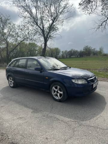 Mazda 323 VI (BJ) Рестайлинг 1.6 MT