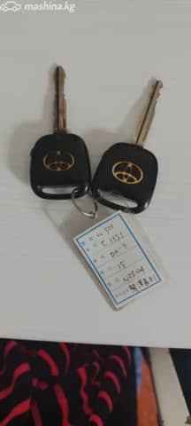 Toyota Corolla IX (E120, E130) 1.5 AT