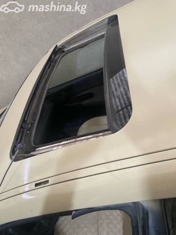 Mazda 323 V (BA) 1.5 AT