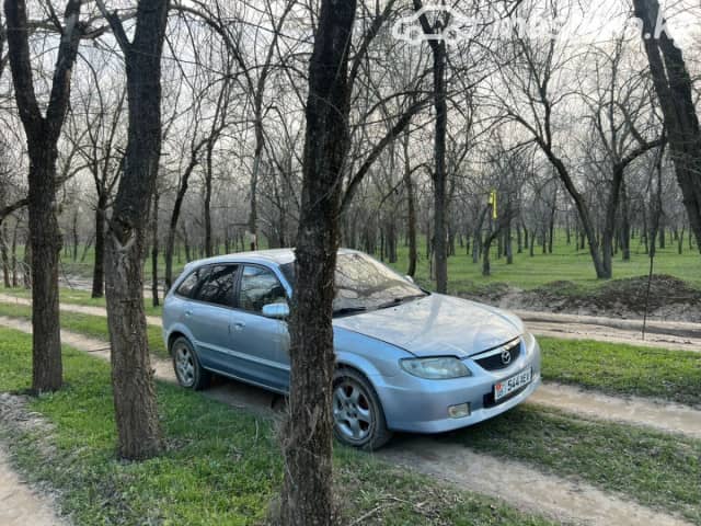 Mazda 323 VI (BJ) Рестайлинг 1.6 MT