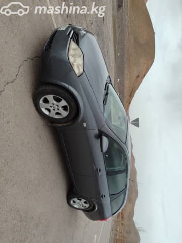 Nissan Primera III (P12) 2.0 MT