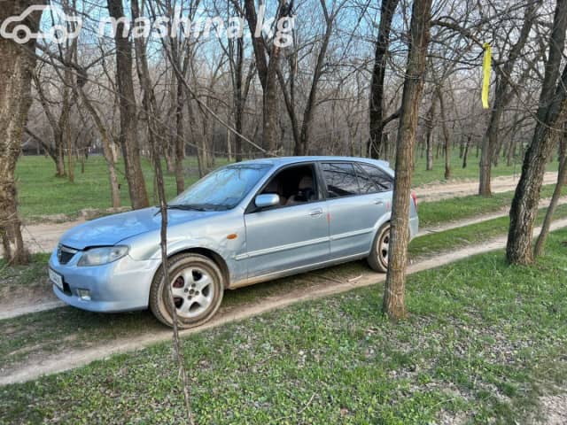 Mazda 323 VI (BJ) Рестайлинг 1.6 MT