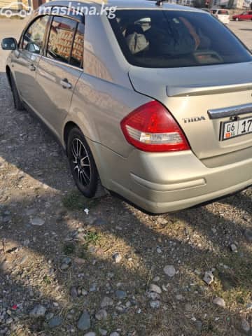 Nissan Tiida I 1.6 MT