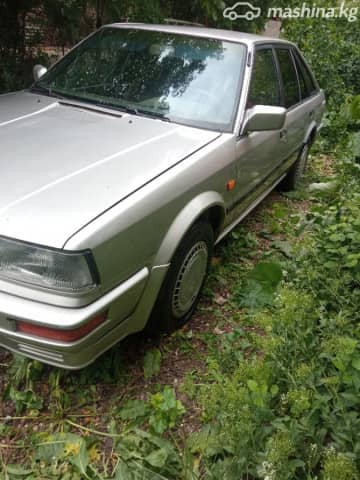 Nissan Bluebird VIII (T12, T72) 2.0 MT