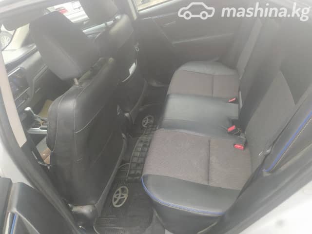 Toyota Corolla XI (E160, E170) Рестайлинг 2 Axio 1.5 CVT