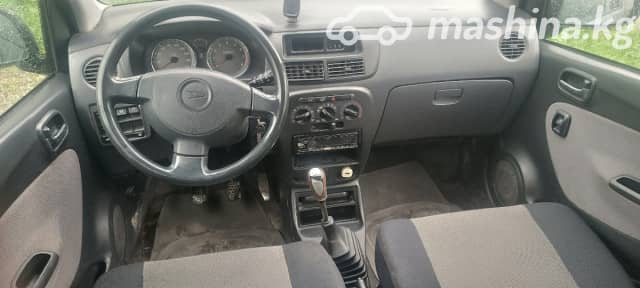 Daihatsu Cuore VI (L251) 1.0 MT