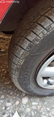 Daihatsu Cuore IV (L500) 0.9 MT