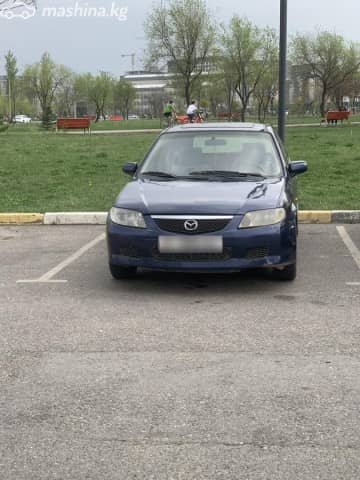 Mazda 323 VI (BJ) Рестайлинг 1.6 MT