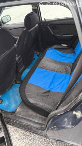 Daewoo Nexia I Рестайлинг 1.6 MT