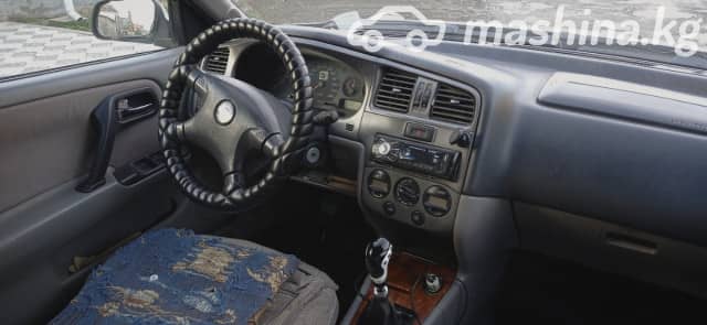 Nissan Primera II (P11) Рестайлинг 1.8 MT