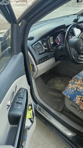 Kia Carnival III 3.3 AT