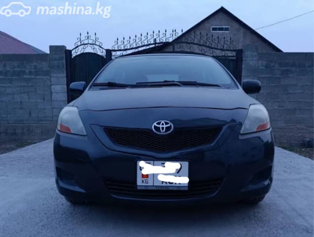 Toyota Yaris II Рестайлинг 1.5 AT