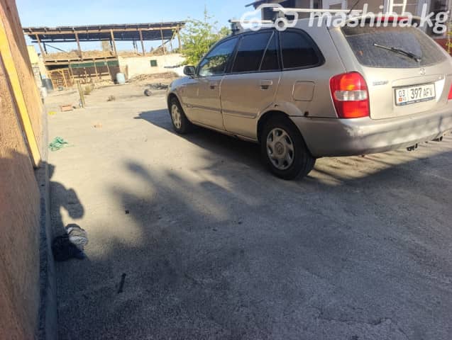 Mazda 323 VI (BJ) Рестайлинг 1.5 MT