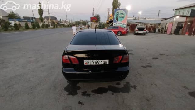 Nissan Primera II (P11) Рестайлинг 1.6 MT