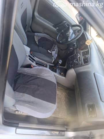 Nissan Primera II (P11) Рестайлинг 1.8 MT