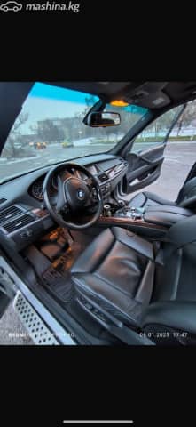 BMW X5 II (E70) 48i 4.8 AT 4WD