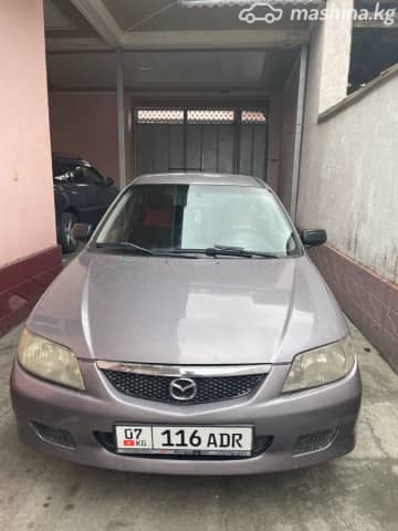 Mazda 323 VI (BJ) Рестайлинг 1.6 MT