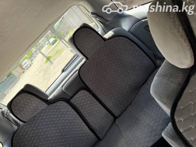Toyota Estima II Рестайлинг 2.4 AT