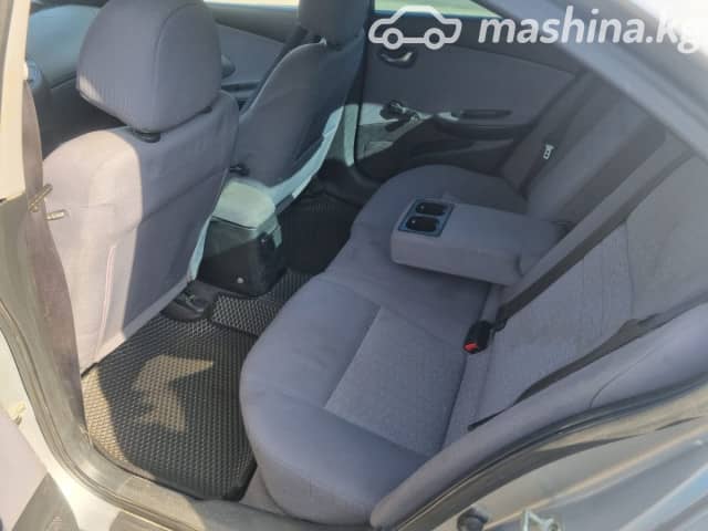 Nissan Primera III (P12) 1.6 MT