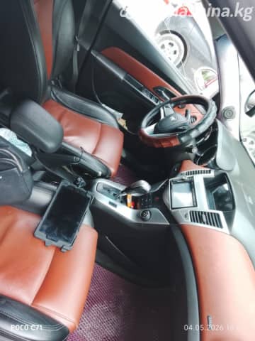 Chevrolet Cruze I 1.6 AT