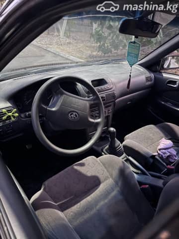Toyota Corolla VIII (E110) 1.6 MT