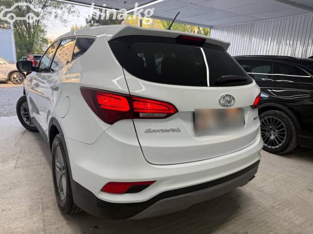 Hyundai Santa Fe III Рестайлинг 2.4 AT