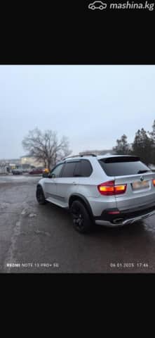 BMW X5 II (E70) 48i 4.8 AT 4WD