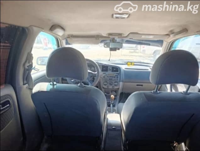 Nissan Primera II (P11) Рестайлинг 1.8 MT