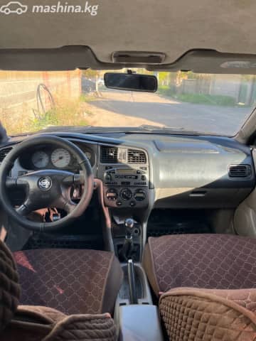 Nissan Primera II (P11) Рестайлинг 1.8 MT
