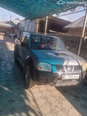 Nissan Navara (Frontier) II (D22) 2.5d MT 4WD