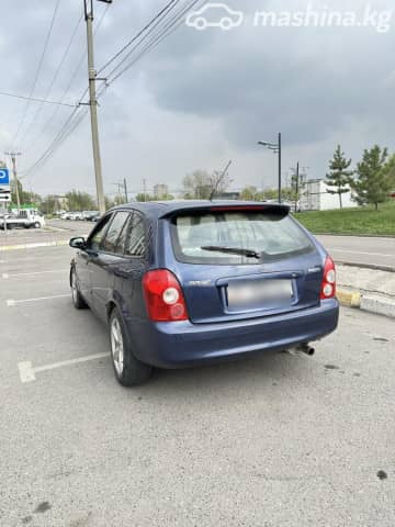 Mazda 323 VI (BJ) Рестайлинг 1.6 MT