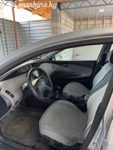 Nissan Primera III (P12) 1.8 MT
