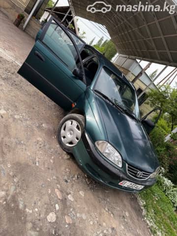 Toyota Avensis I Рестайлинг 1.6 MT
