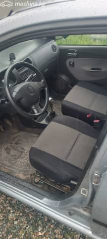 Daihatsu Cuore VI (L251) 1.0 MT