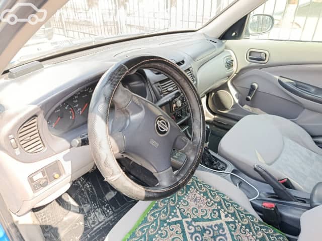 Nissan Almera II (N16) 1.5 MT