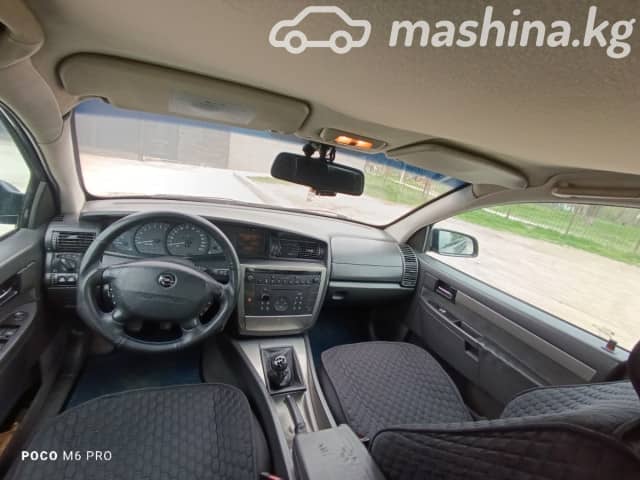 Opel Omega B Рестайлинг 2.2 MT