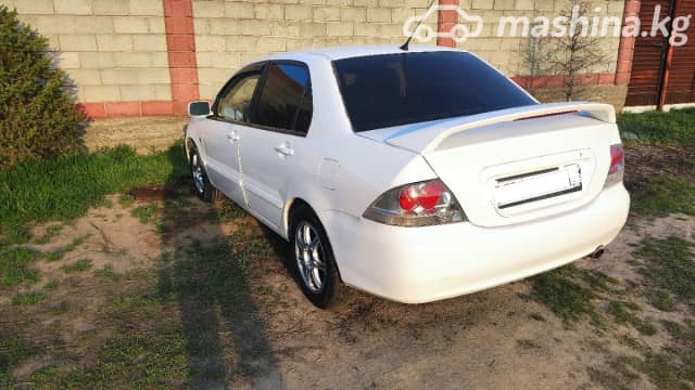 Mitsubishi Lancer IX Рестайлинг 1.6 AT