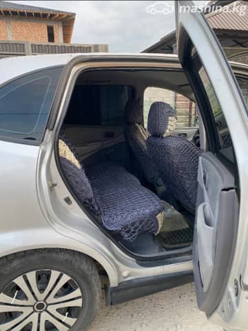 Nissan Almera Tino 1.8 MT