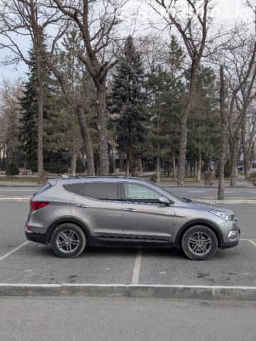 Hyundai Santa Fe III Рестайлинг 2.4 AT