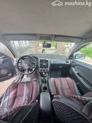Toyota Avensis I Рестайлинг 1.6 MT