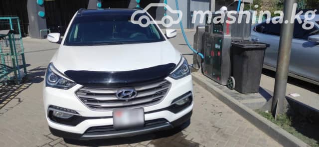 Hyundai Santa Fe III Рестайлинг 2.0 AT 4WD