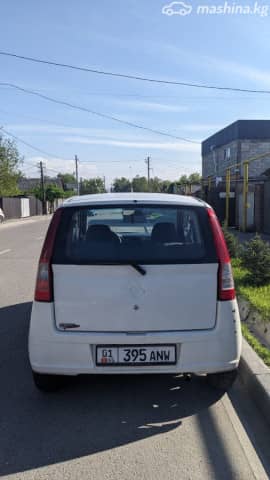 Daihatsu Cuore VI (L251) 1.0 MT