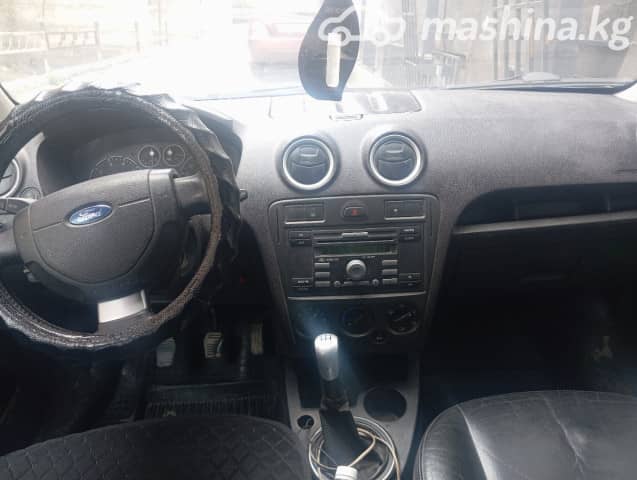 Ford Fusion I Рестайлинг 1.6 MT