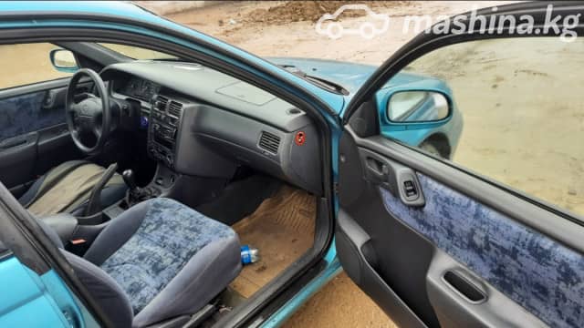 Toyota Carina VI (T190) E 1.8 MT