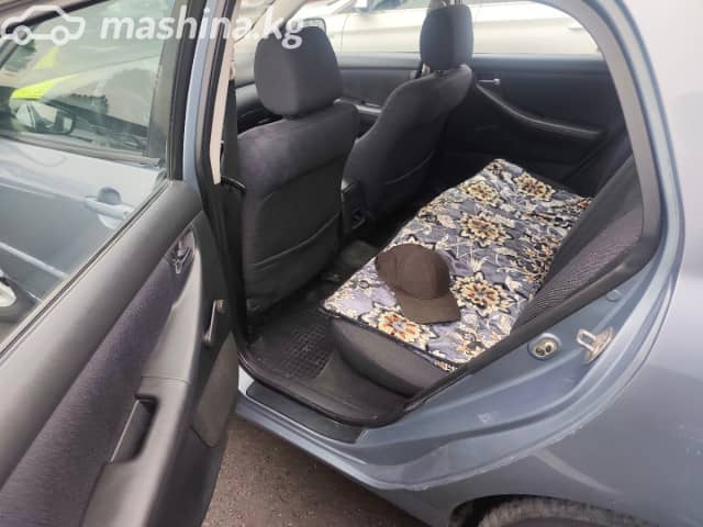 Toyota Corolla IX (E120, E130) 1.6 MT