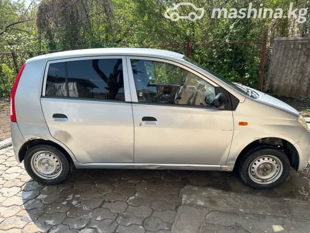 Daihatsu Cuore VI (L251) 1.0 MT