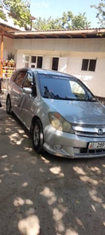 Honda Stream I Рестайлинг 1.7 AT